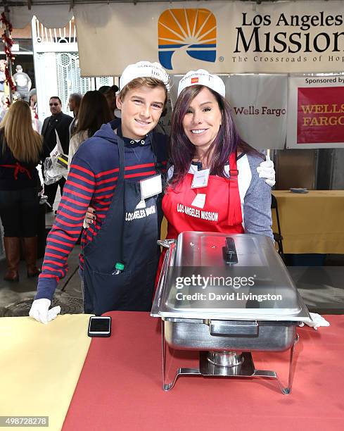 Personality Melissa Rivers and son Cooper Endicott attend Thanksgiving for the Homeless at the Los Angeles Mission on November 25, 2015 in Los...