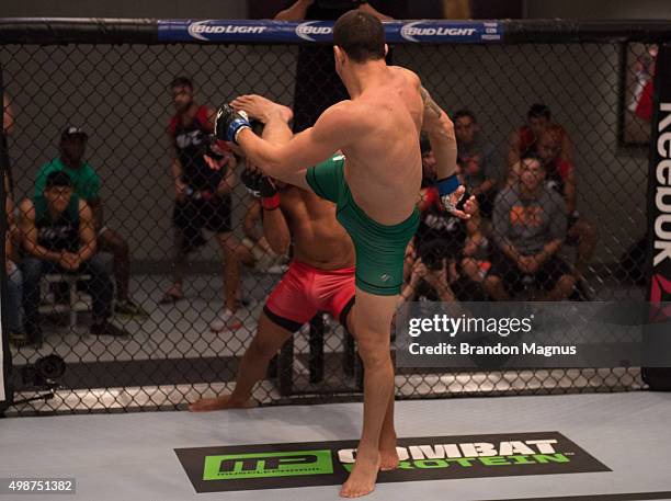 Cesar Arsamendia kicks Enrique Barzola in their semi-finals fight during the filming of The Ultimate Fighter Latin America: Team Gastelum vs Team...