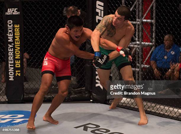 Cesar Arsamendia punches Enrique Barzola in their semi-finals fight during the filming of The Ultimate Fighter Latin America: Team Gastelum vs Team...