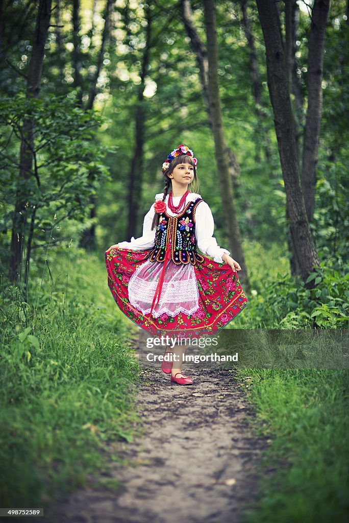 Cute little girl in polish folk costume (Cracow region)