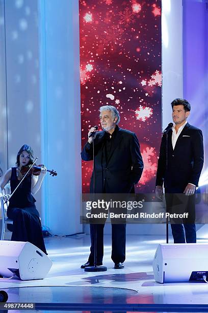 Tenor Opera Singer Placido Domingo and Singer Vincent Niclo perform during 'Vivement Dimanche' TV Show at Pavillon Gabriel on November 25, 2015 in...
