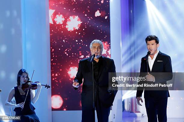 Tenor Opera Singer Placido Domingo and Singer Vincent Niclo perform during 'Vivement Dimanche' TV Show at Pavillon Gabriel on November 25, 2015 in...