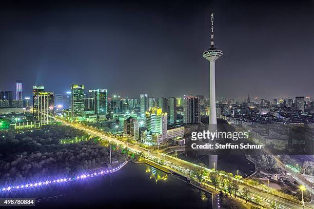 skyline shenyang metropolis modern overview elevated view china - auto nacht stock pictures, royalty-free photos & images