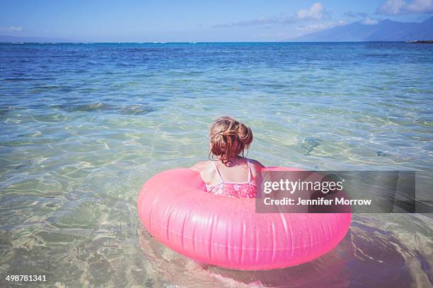 pink raft - tube girl stock-fotos und bilder