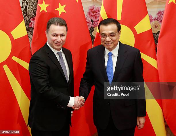 Macedonia's Prime Minister Nikola Gruevski shakes hands with China's Premier Li Keqiang during their meeting, on the sideline of the 4th Meeting of...