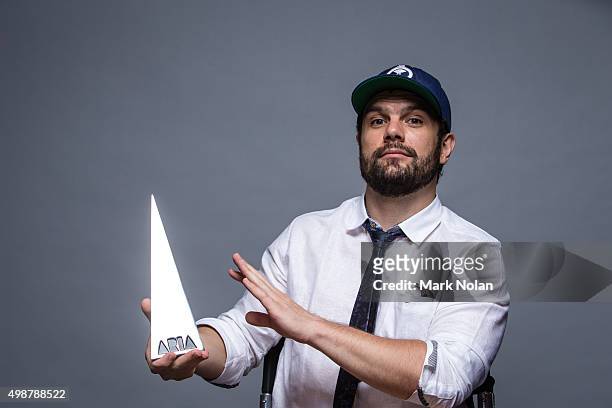 Seth Sentry poses for a portrait with an ARIA for Best Urban Album poses for a portrait during the 29th Annual ARIA Awards 2015 at The Star on...