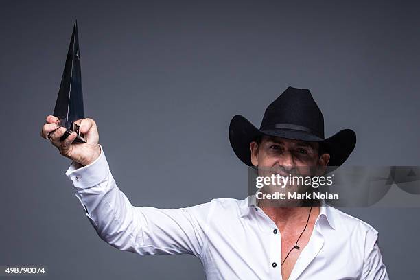 Lee Kernaghan poses for a portrait with an ARIA for Outstanding Achievement Award during the 29th Annual ARIA Awards 2015 at The Star on November 26,...