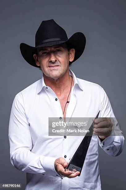 Lee Kernaghan poses for a portrait with an ARIA for Outstanding Achievement Award during the 29th Annual ARIA Awards 2015 at The Star on November 26,...