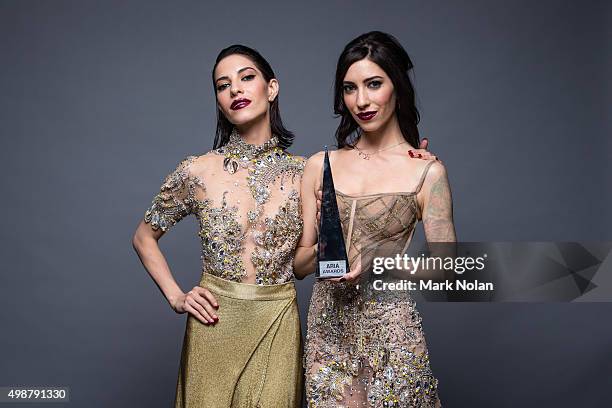 Lisa and Jessica Origliasso from the Veronicas pose for a portrait with an ARIA for Best Video during the 29th Annual ARIA Awards 2015 at The Star on...