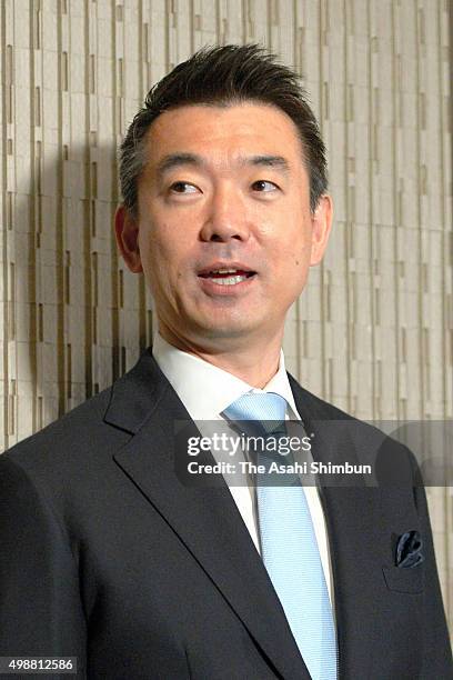 Outgoing Osaka City Mayor Toru Hashimoto speaks to media reporters at Osaka City Hall on November 26, 2015 in Osaka, Japan.