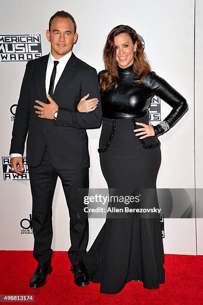 Singer Alanis Morissette and musician Mario Treadway arrive at the 2015 American Music Awards at Microsoft Theater on November 22, 2015 in Los...