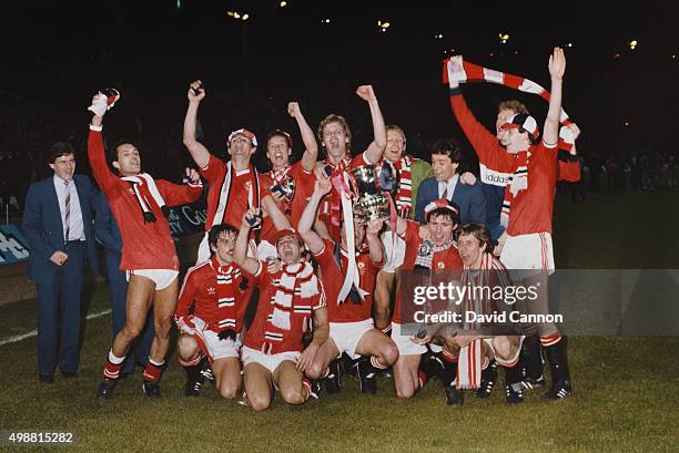 Manchester United celebrate their victory with the trophy after the FA Cup Final replay between Brighton and Hove Albion and Manchester United at...