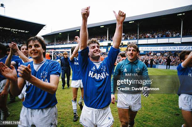 Everton skipper Kevin Ratcliffe Graeme Sharp and Neville Southall do a lap of honour after Everton had beaten Queens Park Rangers 2-0 at Goodison...