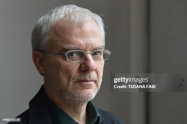 Italian director Daniele Luchetti poses during the photocall of his movie "Chiamatemi Francesco, il Papa della gente" on November 26, 2015 in Rome....