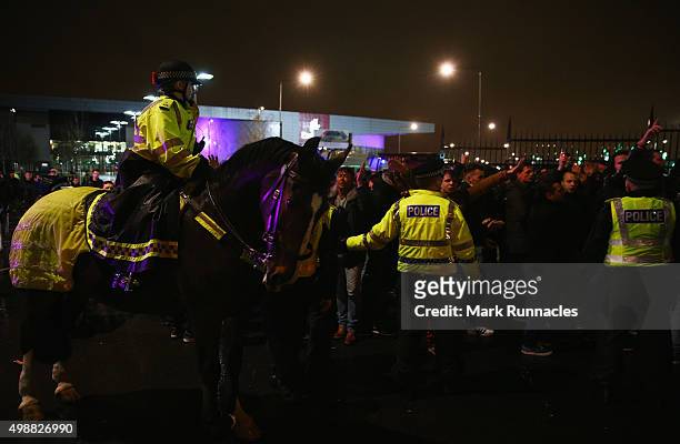 Police patrol outside the stadium prior to the UEFA Europa League Group A match between Celtic FC and AFC Ajax at Celtic Park on November 26, 2015 in...