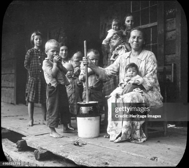 Butter-making, Appalachia, USA, c1917. Photograph taken during Cecil Sharp's folk music collecting expedition: British musician Sharp and his...