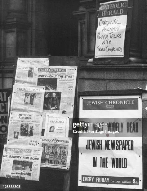 The Jewish Chronicle on sale outside Westminster Cathedral, London, 23 January 1966. The most widely read Jewish newspaper in the world for sale...