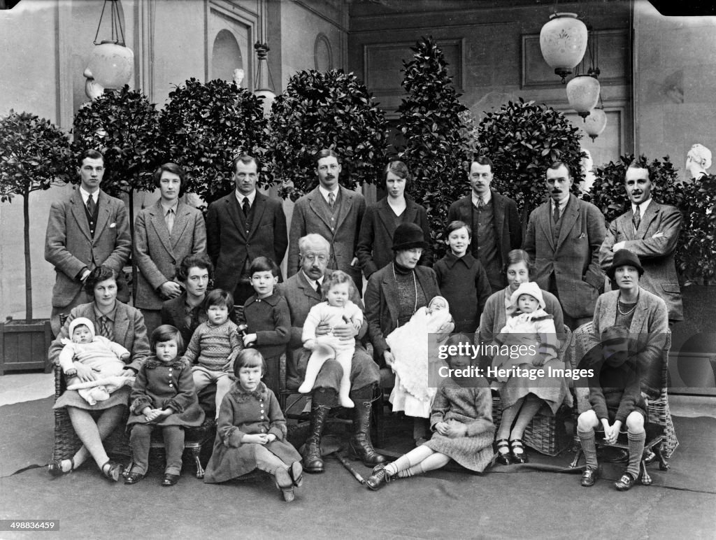 The 9th Duke of Devonshire with his children and grandchildren at Chatsworth, Christmas 1925. Artist: JR Board