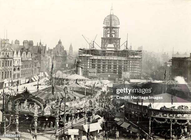Goose Fair, Market Place, Nottingham, Nottinghamshire, 1927. East aspect, looking towards The Council House, under construction, from Beastmarket...