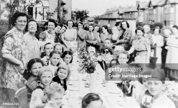 Day party, Park Avenue, Carlton, Nottingham, Nottinghamshire, May 1945. VE Day finally arrived on 8th May, 1945 after fierce efforts by the allied...