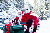Santa Claus Sitting in His Sleigh Waving