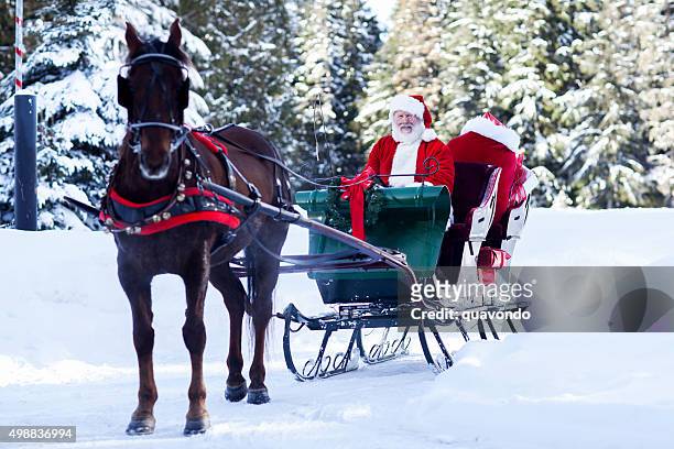 santa claus sitting in his sleigh - carriage stock pictures, royalty-free photos & images