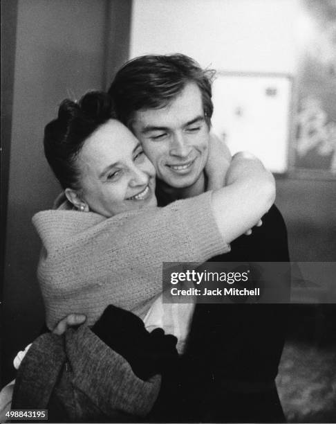 Russian-born French Rudolf Nureyev hugs a staff member at the American Ballet Theatre School, New York, New York, September 1962.
