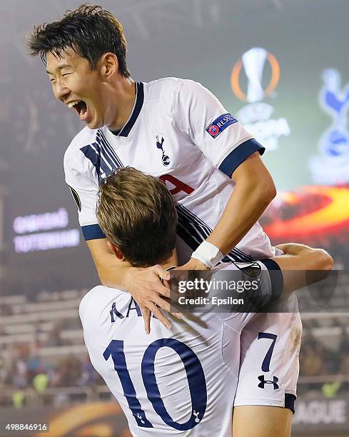 Harry Kane of Tottenham Hotspur FC is congratulated on scoring the opening goal by Son Heung-min during the UEFA Europe League match between Qarabag...