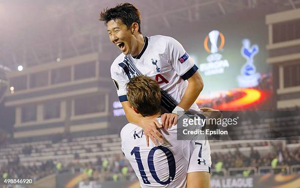 Harry Kane of Tottenham Hotspur FC is congratulated on scoring the opening goal by Son Heung-min during the UEFA Europe League match between Qarabag...