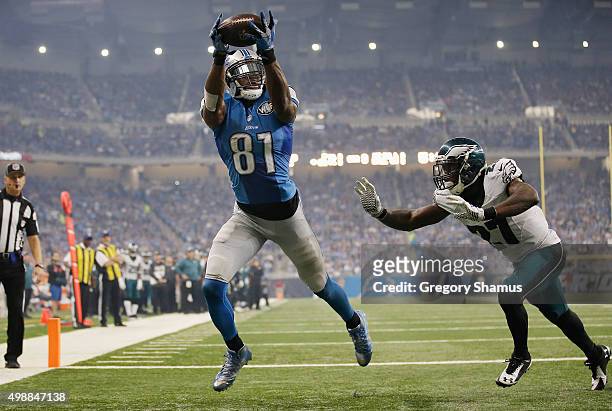 Calvin Johnson of the Detroit Lions catches a third quarter touchdown pass in front of Malcolm Jenkins of the Philadelphia Eagles at Ford Field on...