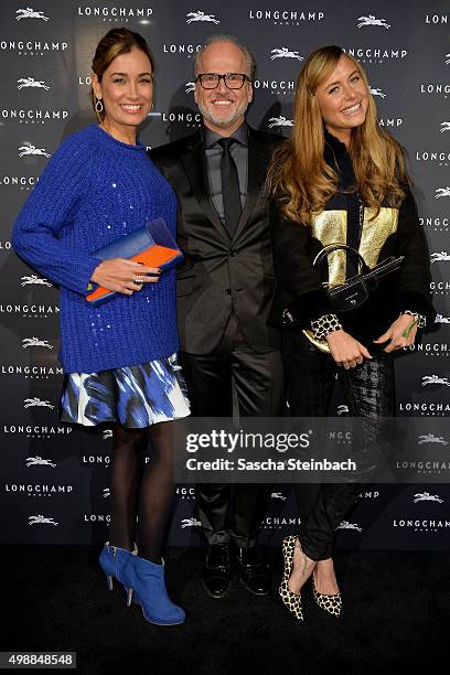 Jana Ina Zerella, Markus Wahl of Longchamp and Alina Gerber attend the Longchamp store opening on November 26, 2015 in Cologne, Germany.