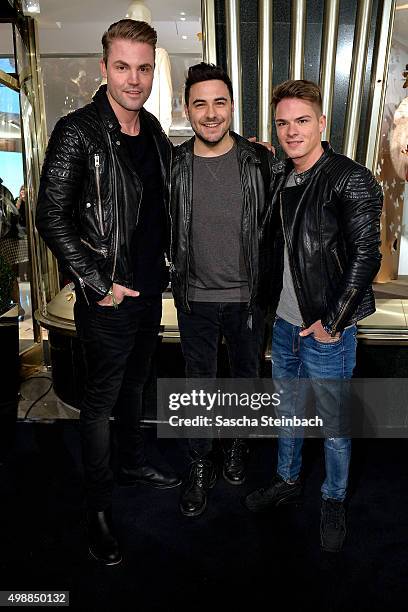 Benjamin Heinrich, Lars Steinhoefel and Marvin Linke attend the Longchamp store opening on November 26, 2015 in Cologne, Germany.