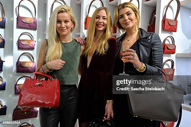 Guests attend the Longchamp store opening on November 26, 2015 in Cologne, Germany.