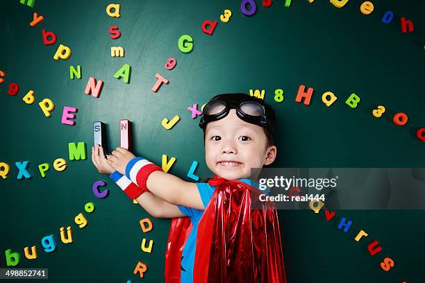 super hero - number magnet stock pictures, royalty-free photos & images