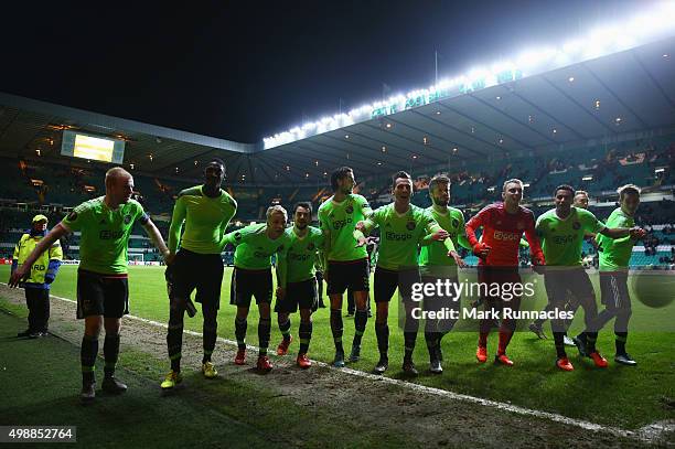 Ajax players celebrate victory after the UEFA Europa League Group A match between Celtic FC and AFC Ajax at Celtic Park on November 26, 2015 in...