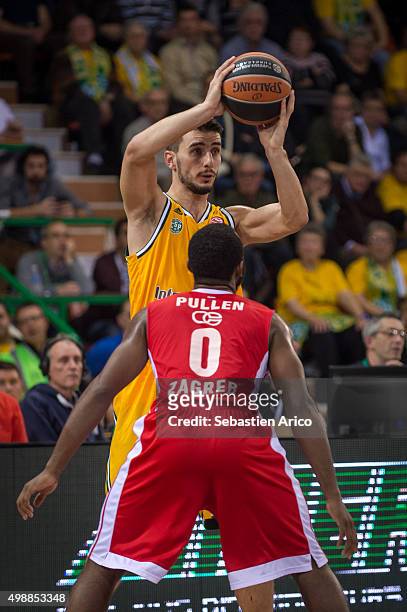 Leo Westermann, #9 of Limoges CSP competes with Jacob Pullen, #0 of Cedevita Zagreb during the Turkish Airlines Euroleague Regular Season Round 7...