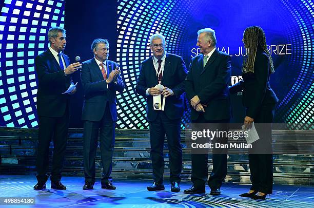 Warriors documentary film are presented with the Special Jury Award by Joel Bouzou President & Founder of Peace & Sport and Pal Schmitt IOC Member...