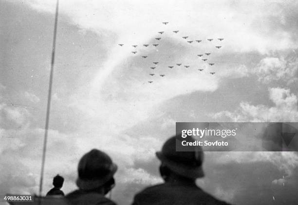 Squadron of Soviet military planes flying in formation of a five-pointed star - the symbol of the Red Army. August 1935.