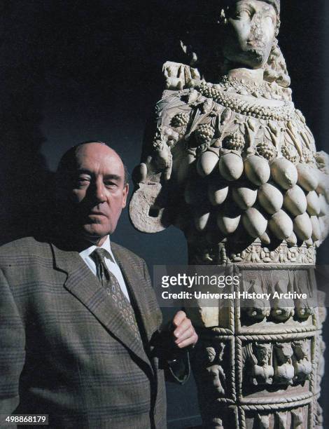 Desmond Morris with a statue of Artemis at Ephesus, Turkey, filming the TV series The Human Sexes, 1997.