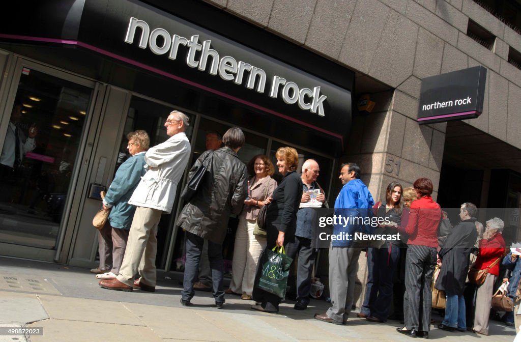 People queuing outside a branch of Northern Rock at the height of the insuing banking crisis in 2008