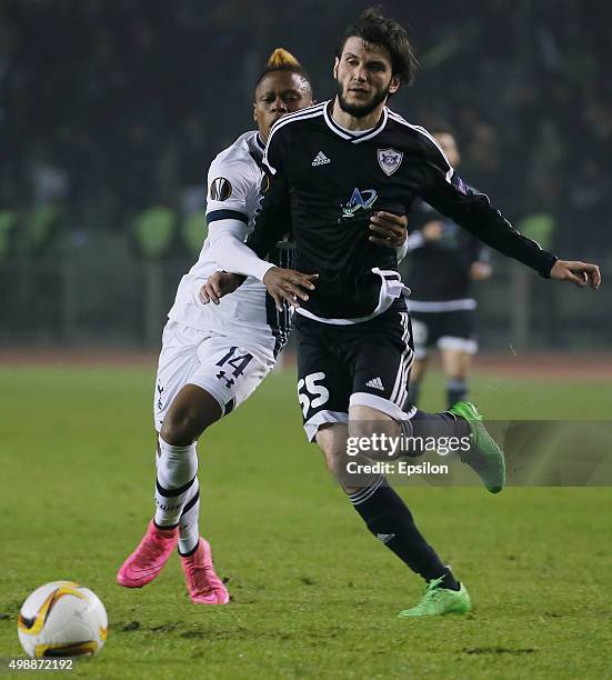 Badavi Guseynov of Qarabag FK ?hallenged by Clinton N'Jie of Tottenham Hotspur FC during the UEFA Europe League match between Qarabag FK and...