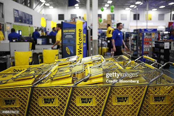 Shopping carts sit in lines at a Best Buy Co. Store ahead of Black Friday in Chesapeake, Virginia, U.S., on Thursday, Nov. 26, 2015. In 2011, several...