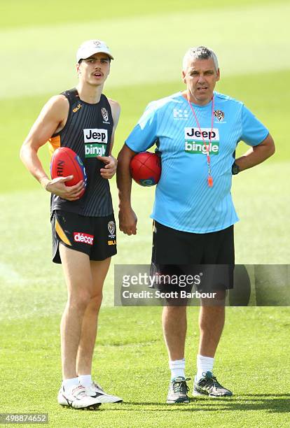 Draftee Oleg Markov and Mark Williams, Senior Development Coach look on during a Richmond Tigers AFL training session at ME Bank Centre on November...