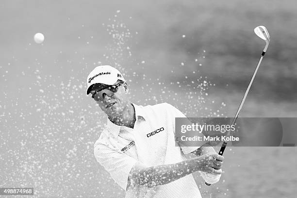 John Senden of Australia plays a bunker shot on the 4th hole during day two of the Australian Open at the Australian Golf Club on November 27, 2015...