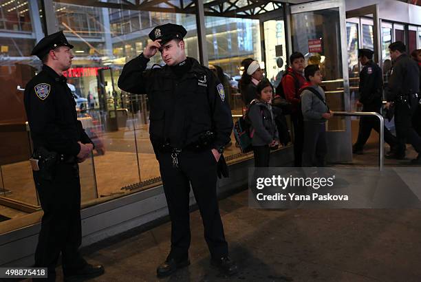 Port Authority Police Officers patrol the area around the Port Authority Bus terminal on November 26, 2015 in New York City. Security has been...