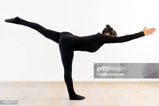 woman at pilates excercise - positioning stock pictures, royalty-free photos & images