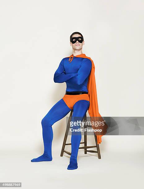 man dressed as a superhero - bühnenkostüm stock-fotos und bilder