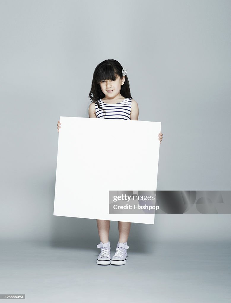 Person holding blank card