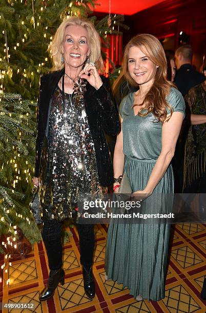 Birgit Bergen and Silke Popp during a christmas party at Hotel Vier Jahreszeiten Kempinski on November 26, 2015 in Munich, Germany.