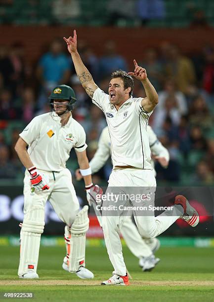 Doug Bracewell of New Zealand celebrates dismissing Joe Burns of Australia during day one of the Third Test match between Australia and New Zealand...
